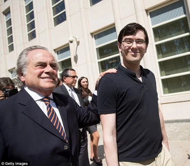 Martin Shkreli, seen here Friday smiling as he left court with his lead defense attorney, was convicted on federal charges he deceived investors in a pair of failed hedge funds