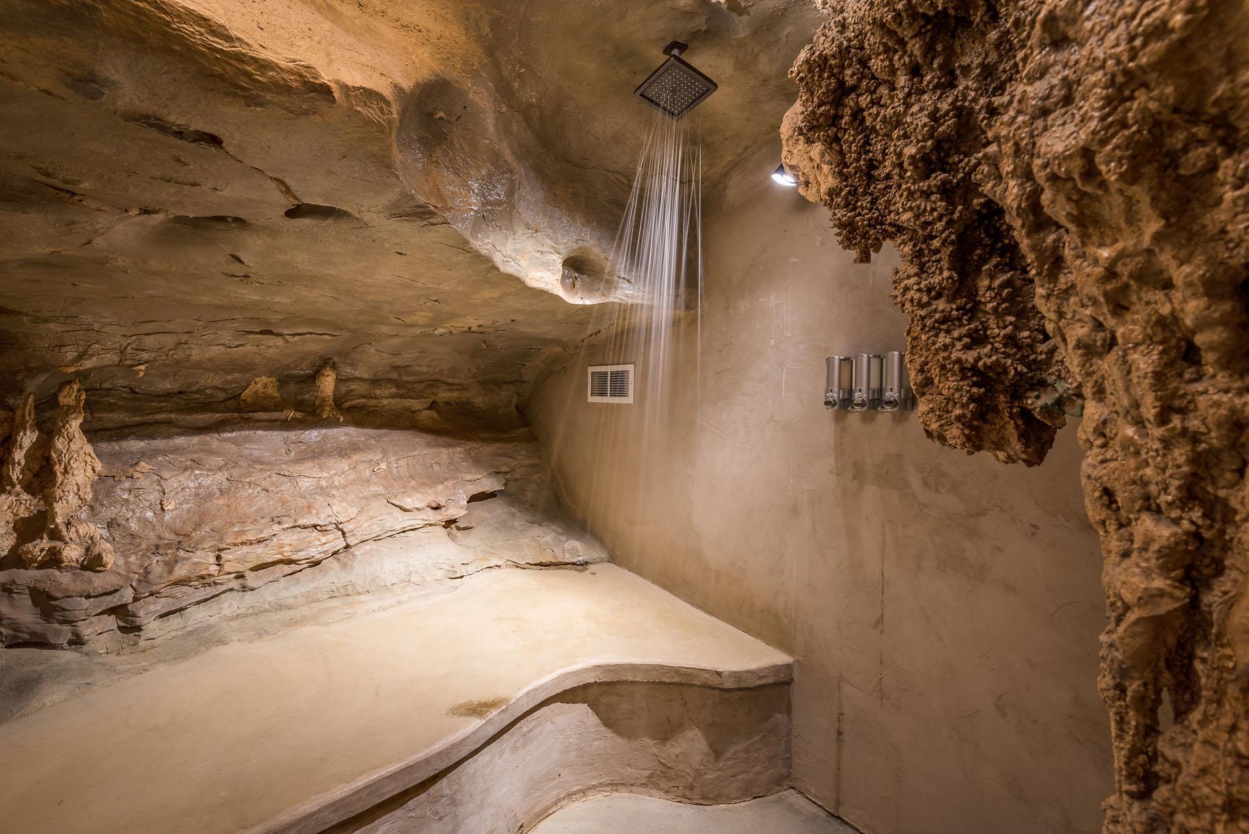  The shower is supplied by the cave's own geothermal underground spring